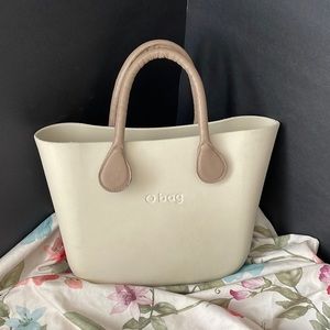 O Bag Tote bag with drawstring inner canvas pouch.